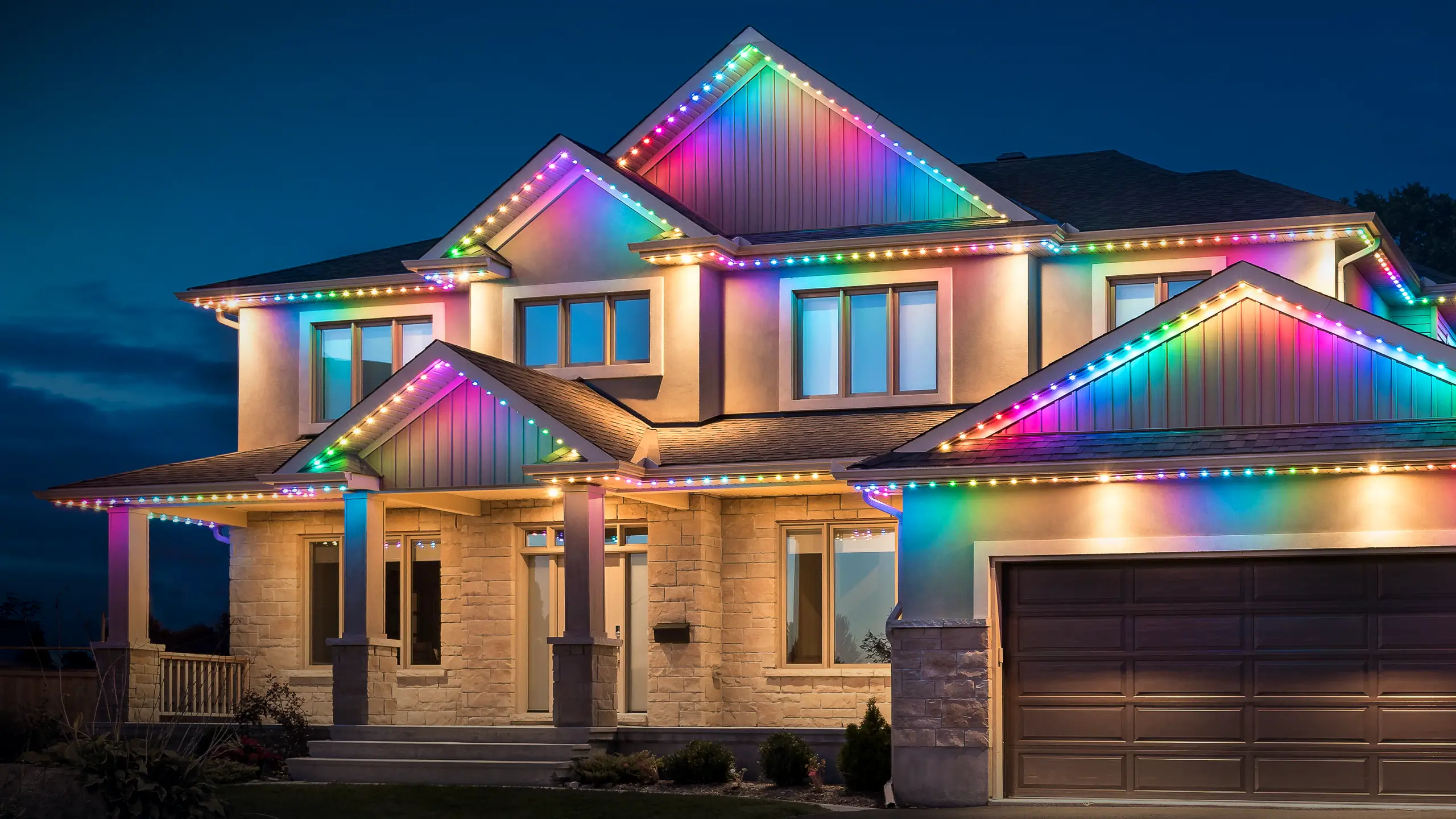 Luxury home with Celebright permanent architectural lighting at night